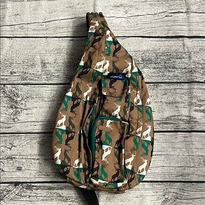 Kavu Sling Bag with Deer Pattern in Brown and Green Buck Wild print